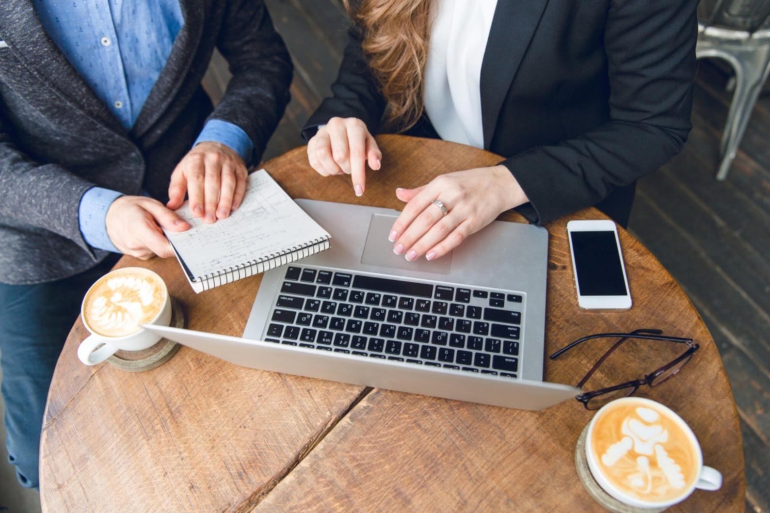 Business planning workspace with financial analysis and market research materials